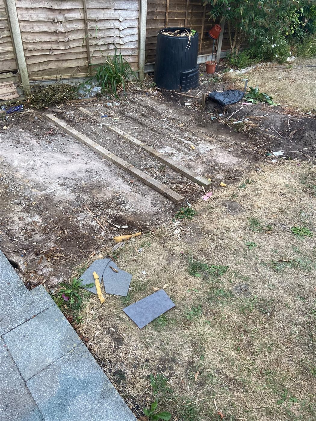 The existing shed base before the extension work began.