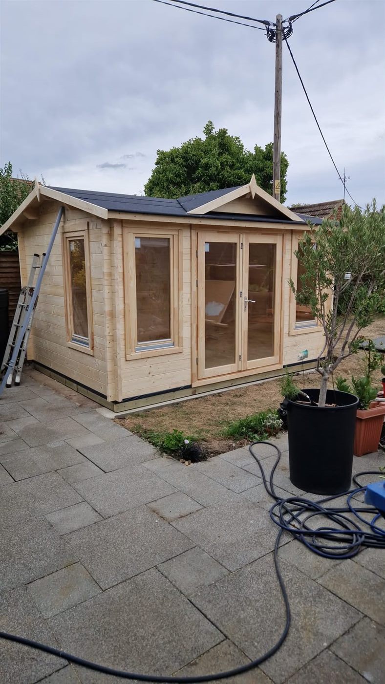 The log cabin in place on the extended base.
