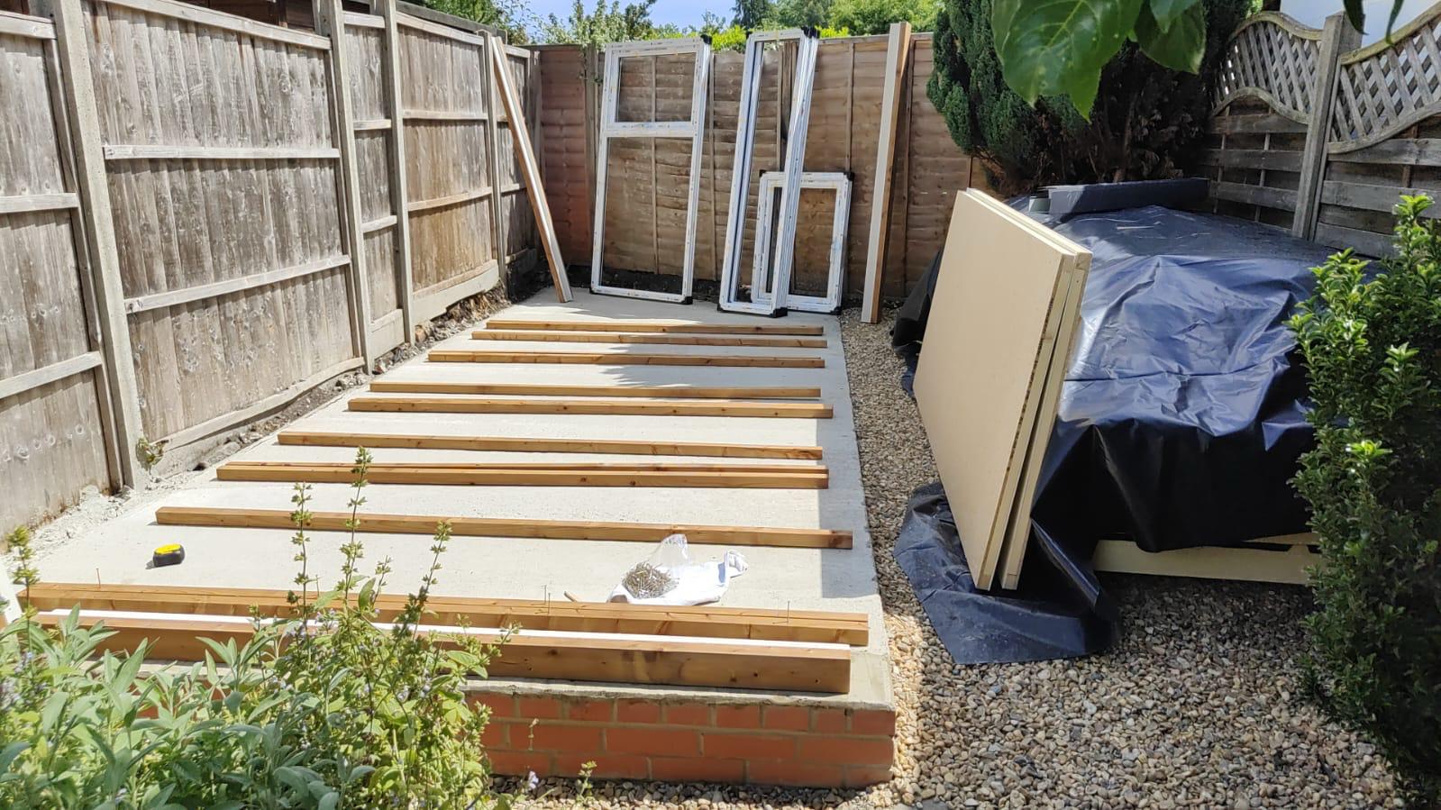 Completed concrete base for a garden building